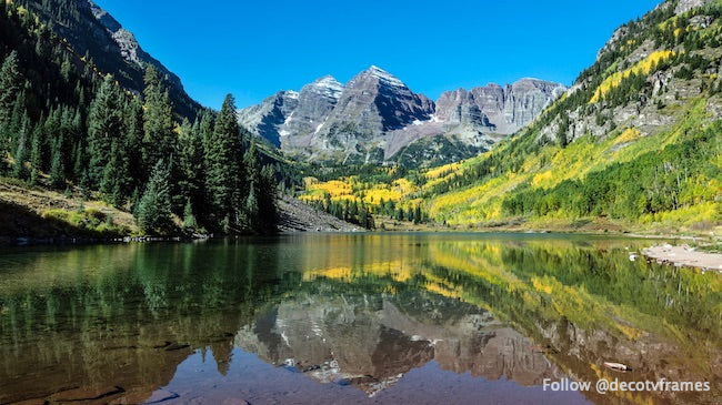Autumnal view of Rocky Mountain peaks called the Maroon Bells, between Pitkin County and Gunnison County, Colorado