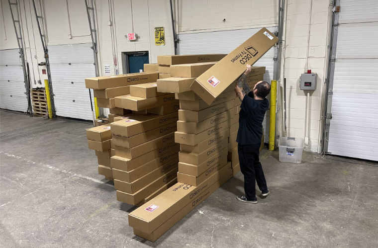 Warehouse worker shipping products