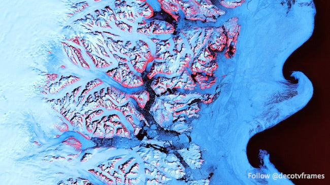 Along the southeastern coast of Greenland, an intricate network of fjords funnels glacial ice to the Atlantic Ocean